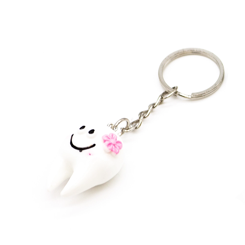 Брелок пластмассовый с зубиком, розовый Брелок пластмассовый с зубиком, розовый